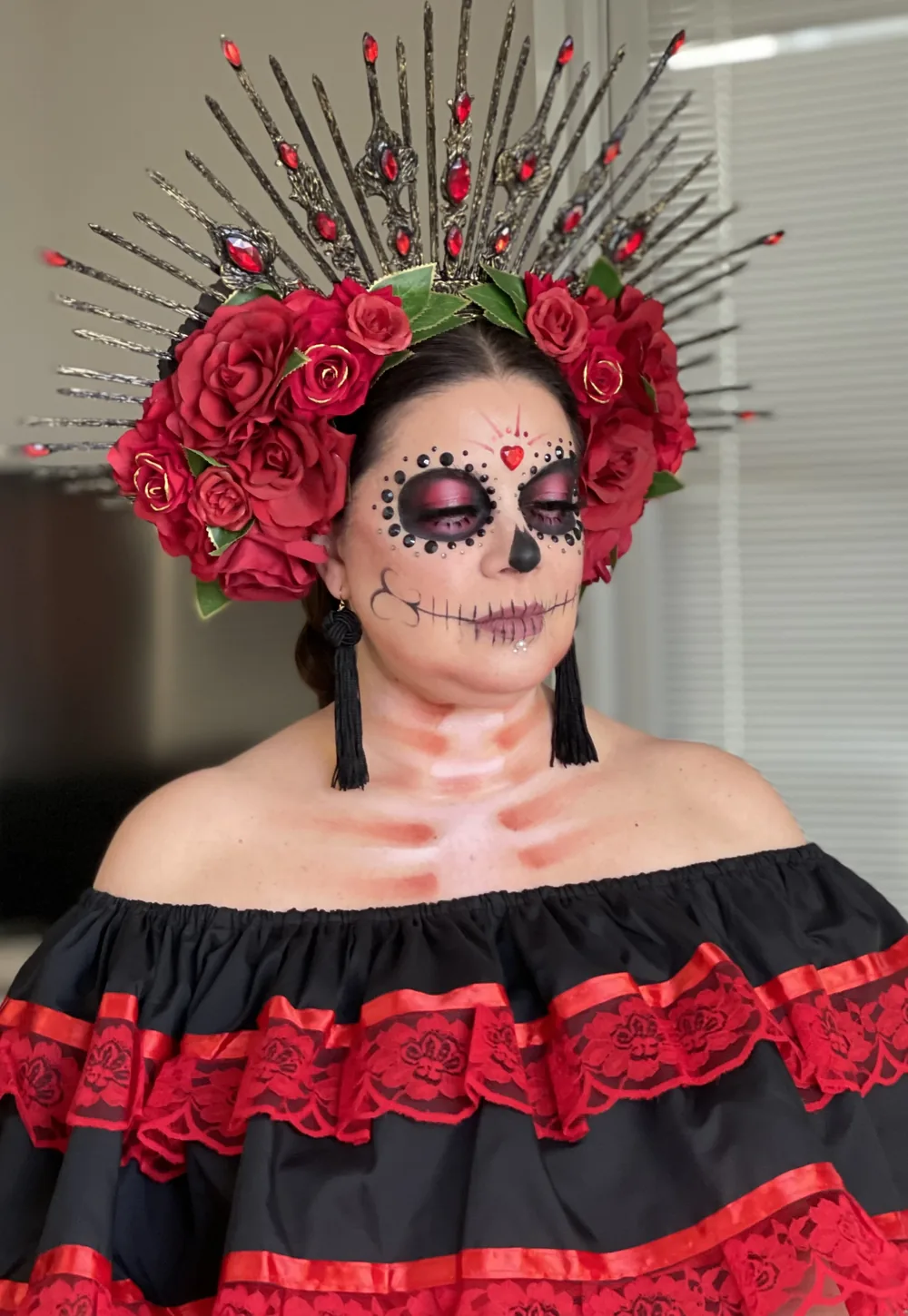 Catrina with a red rose crown and spiked halo