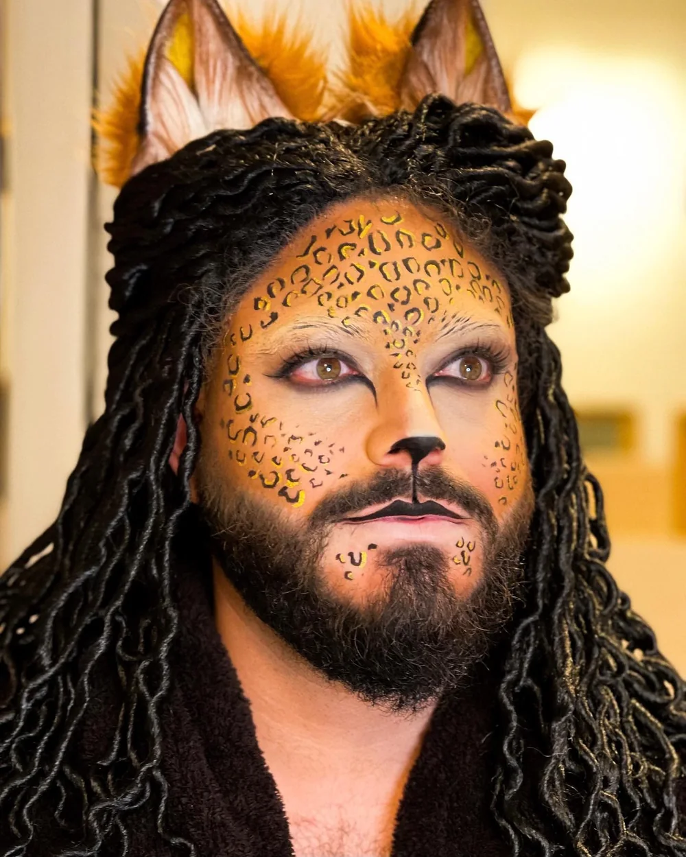 Leopard character with sculpted ears and locs