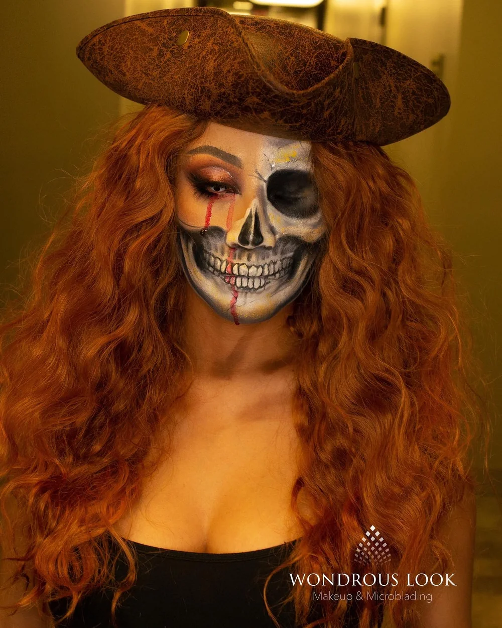 Half skull pirate with blood detail and red hair