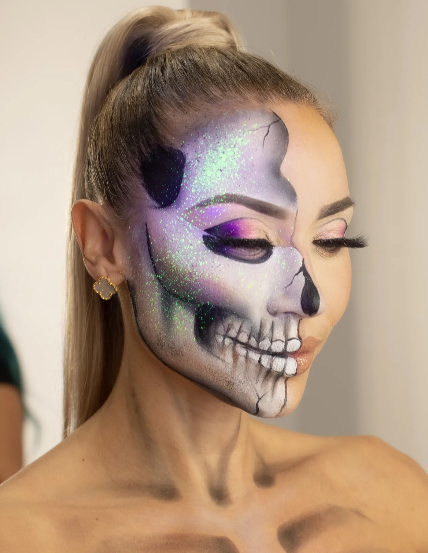 Half glam, half glitter skull Halloween makeup by Wondrous Look in Miami